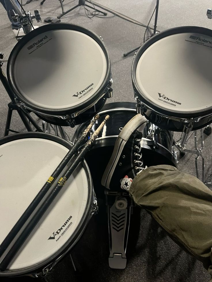 Drums, guitar and keyboard in a creative studio